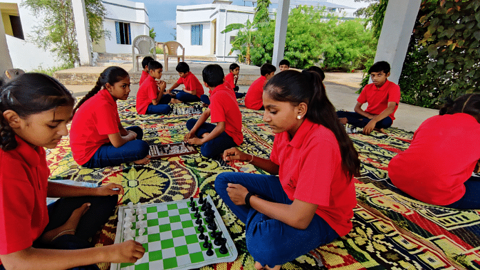 Children playing chess during the break time. They keep a record of the games they've won and lost | Photo: Stendra Singh