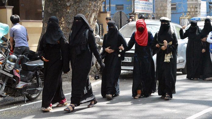 Representational image | Students in hijab and burkha arrive at college in Bengaluru | ANI File Photo