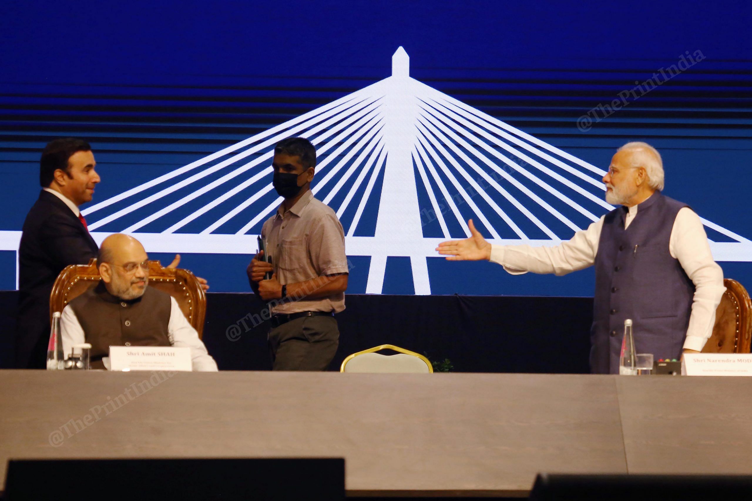 Prime Minister Narendra Modi shaking hand with INTERPOL President Ahmed Naser Al-Raisi after his speech during the 90th General Assembly of INTERPOL | Photo: Praveen Jain | ThePrint