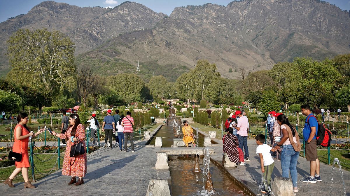 Tourists visit Nishat Garden in Srinagar | Reuters