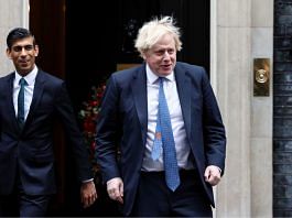 Boris Johnson and Rishi Sunak walk out of Downing Street in London | Reuters file photo