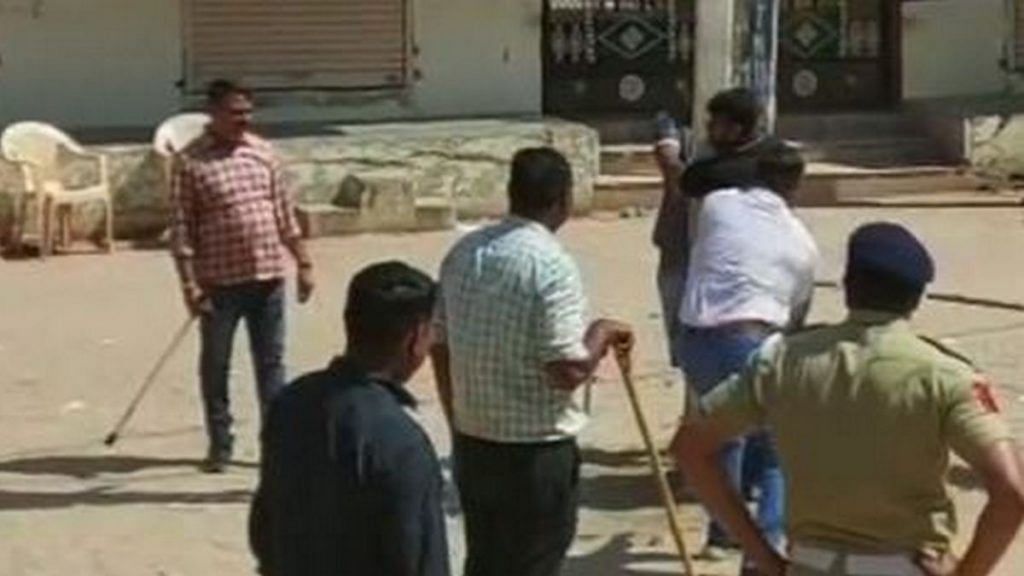 A video of police personnel flogging Muslim men in Kheda | Twitter