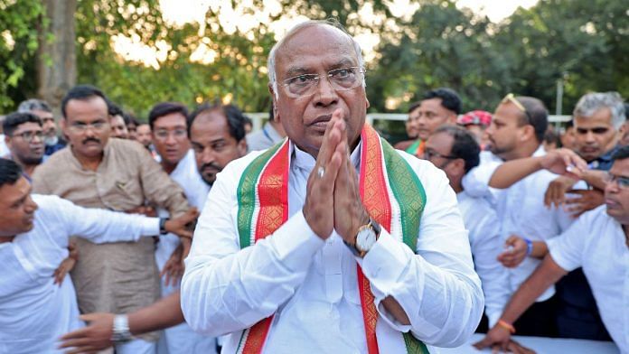 Mallikarjun Kharge, the newly elected president of the Congress party, greets his supporters at his residence in New Delhi, on 19 October 2022 | Reuters/Altaf Hussain