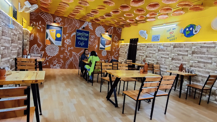 The cafe is well decorated with different paintings promoting a plastic-free surrounding | Satendra Singh/ThePrint