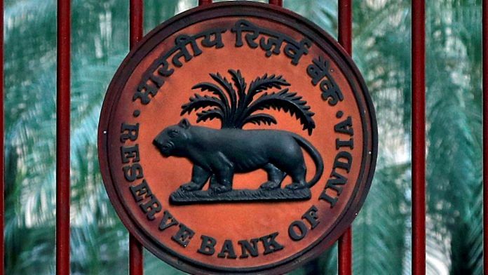 A Reserve Bank of India (RBI) logo is seen at the gate of its office in New Delhi | Reuters file photo