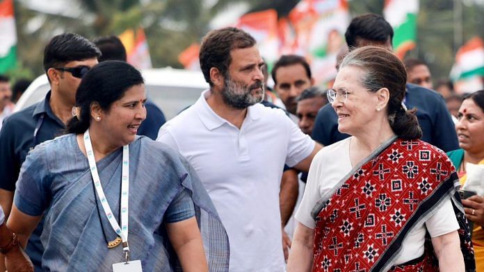 Congress interim president Sonia Gandhi interacts with a party supporter in the presence of party leader Rahul Gandhi during the party's 'Bharat Jodo Yatra' in Mandya, Karnataka | ANI