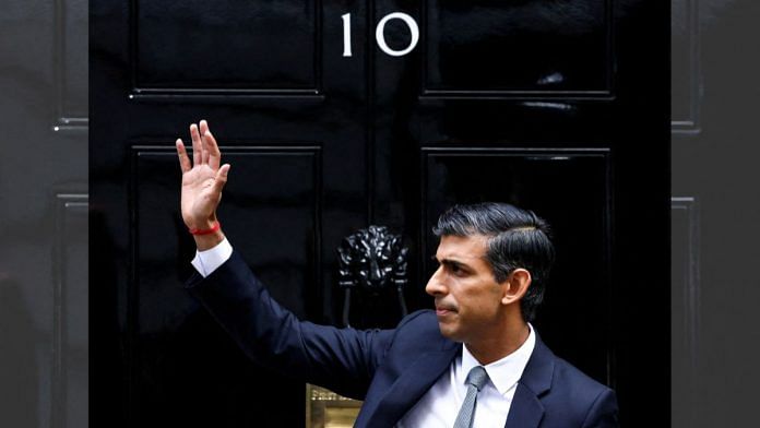 Britain's new Prime Minister Rishi Sunak waves as he enters Number 10 Downing Street in London, on 25 October 2022 | Reuters