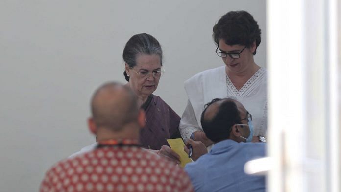 Sonia Gandhi and Priyanka Gandhi Vadra during the polling for Congress president in New Delhi on 17 October 2022