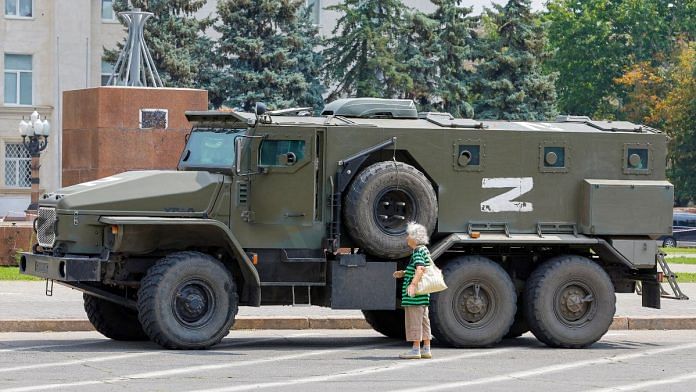 An armoured truck of pro-Russian troops is parked near Ukraine's former regional council's building in Kherson | Reuters file photo