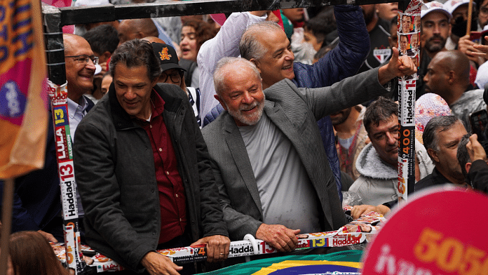 Brazil's former President and presidential candidate Luiz Inacio Lula da Silva leads a silent march in Sao Paulo | Source: Reuters/Mariana Greif