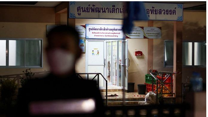 A police officer stands outside a day care center which was the scene of a mass shooting, in the town of Uthai Sawan, around 500 km northeast of Bangkok in the province of Nong Bua Lam Phu, Thailand 6 October, 2022 | Reuters