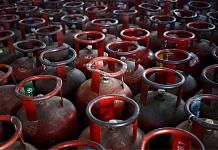 Empty Liquefied Petroleum Gas (LPG) cylinders are seen at a gas distribution centre in UP's Dujana village | Reuters file photo