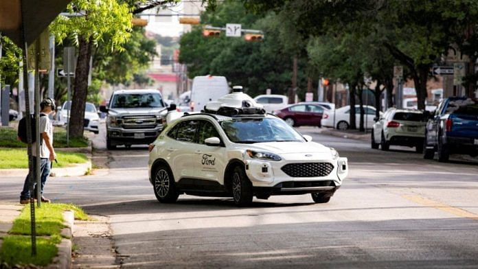 File photo of a driverless car operated by Argo AI drives in Austin, Texas on 12 May 2022 | Photo via Reuters