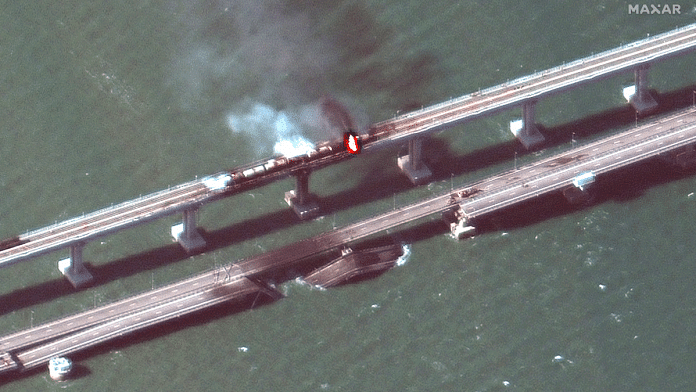 A satellite image shows a close up view of smoke rising from a fire on the Kerch bridge in the Kerch Strait, Crimea, on 8 October 2022 | Maxar Technologies/Handout via Reuters