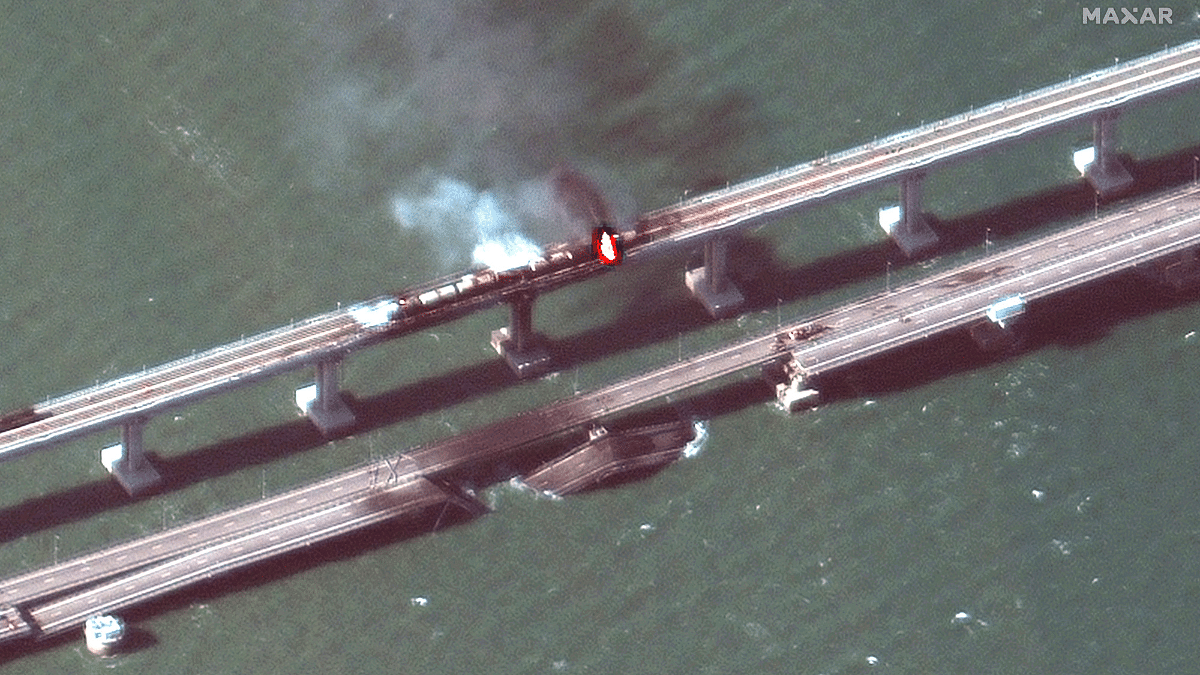 A satellite image shows a close up view of smoke rising from a fire on the Kerch bridge in the Kerch Strait, Crimea, on 8 October 2022 | Maxar Technologies/Handout via Reuters