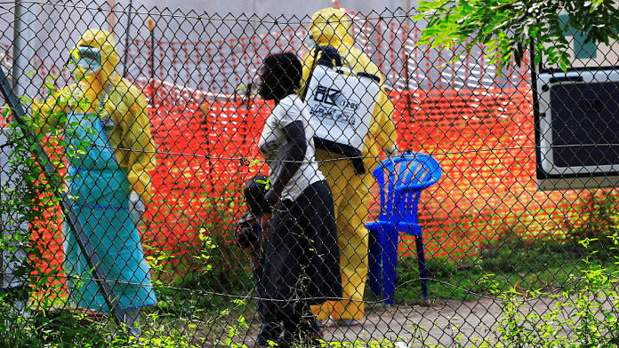 A woman and her child arrive for ebola related investigation at the health facility at the Bwera general hospital near the border with the Democratic Republic of Congo in Bwera, Uganda in June 2019. Reuters/James Akena/File Photo