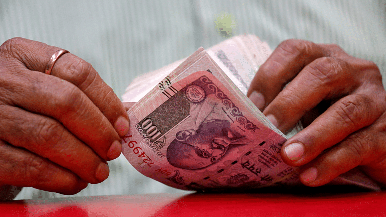 Indian rupee could hit $84-85 by March on trade deficit, oil woes, report says