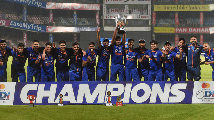 Team India pose for photos with the trophy after winning the 3rd and final ODI cricket match of the series against South Africa, on 11 October 2022 | PTI