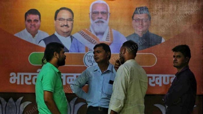BJP workers at party office in Dehradun Monday | Praveen Jain | ThePrint