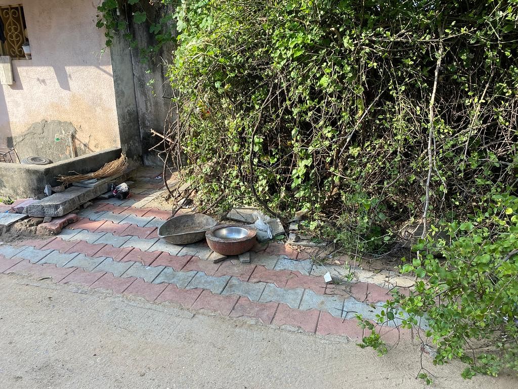 Some utensils are kept outside most houses in the village to feed dogs| Nootan Sharma, ThePrint