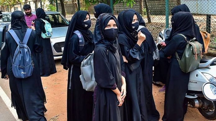 Representational image | File photo of students in hijab leaving after not being allowed to attend class at a government women's college in Udupi | PTI Photo