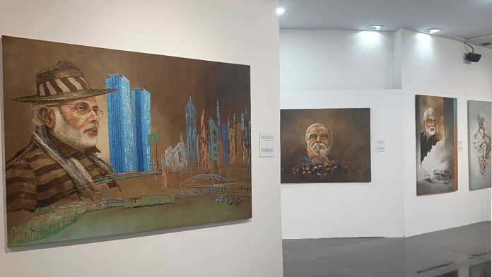 Paintings by Akbar Saheb at NGMA as part of an exhibition inspired by the journey and vision of PM Modi | Unnati Sharma / ThePrint