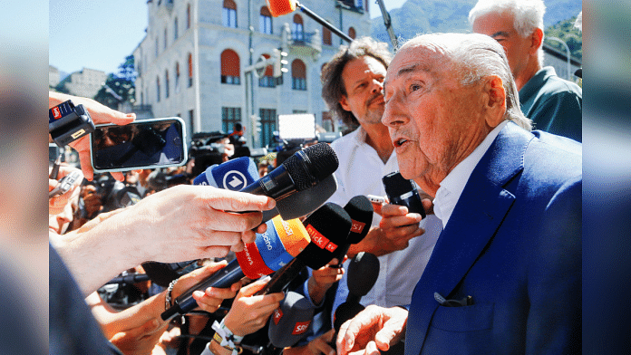 Former FIFA President Sepp Blatter speaks to the media after a trial at the Swiss Federal Criminal Court in Bellinzona, Switzerland 8 July, 2022. Photo: Reuters/Arnd Wiegmann