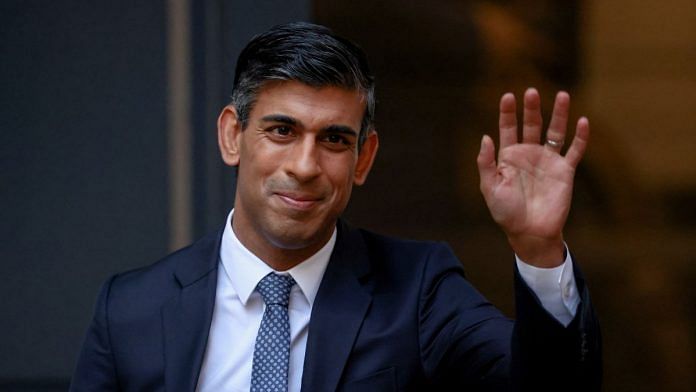 New leader of Britain's Conservative Party Rishi Sunak waves outside the party's headquarters in London, on 24 October 2022 | Reuters/Henry Nicholls