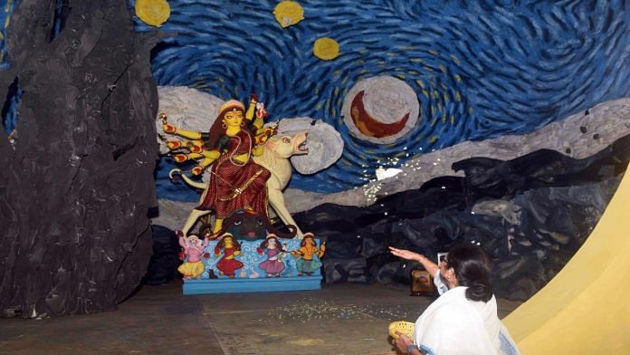 File photo of West Bengal Chief Minister Mamata Banerjee inaugurating the Hindustan Park Durga Puja pandal in Kolkata, which recreated Vincent van Gogh’s famous painting Starry Night | ANI