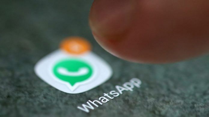 The WhatsApp app logo is seen on a smartphone | Representational image | Reuters