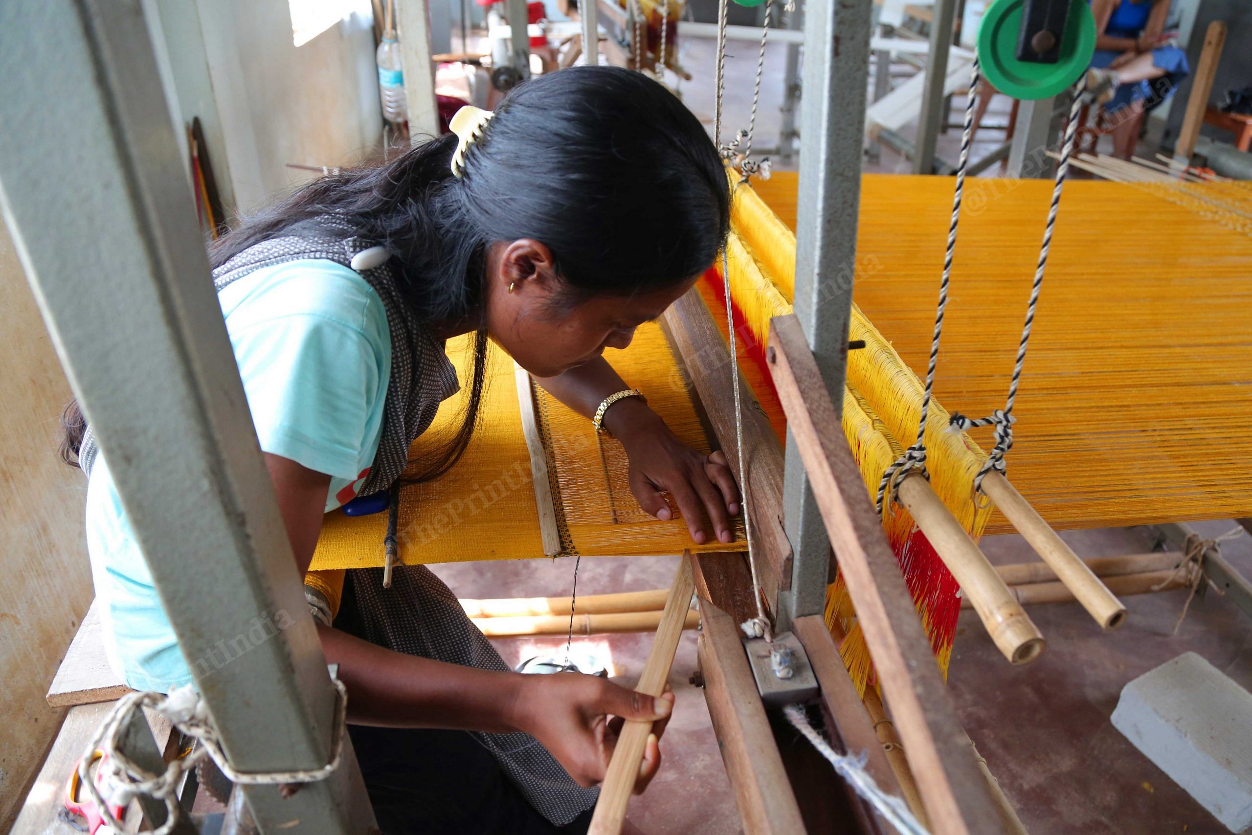 A woman spinning Eri silk threads in Meghalaya's Umden-Diwon | Suraj Singh Bisht/ThePrint