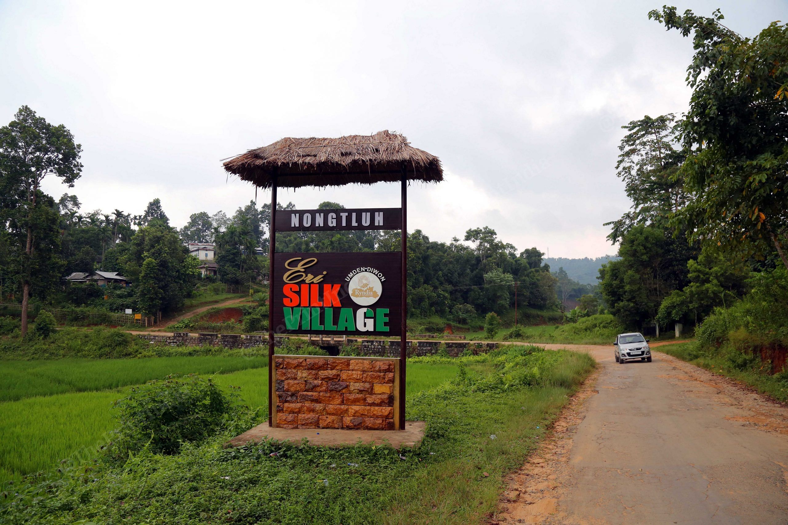 The signboard of Meghala Eri silk village | Suraj Singh Bisht/ThePrint