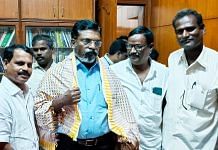 VCK chief Thol. Thirumavalavan (in blue) at a public meeting | Twitter/ @thirumaofficial