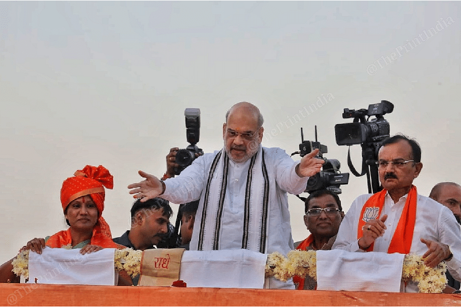 Shah interacts with the people during the roadshow | Photo: Praveen Jain | ThePrint