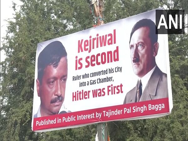 Poster comparing Kejriwal to Adolf Hitler put up outside BJP headquarters in Delhi