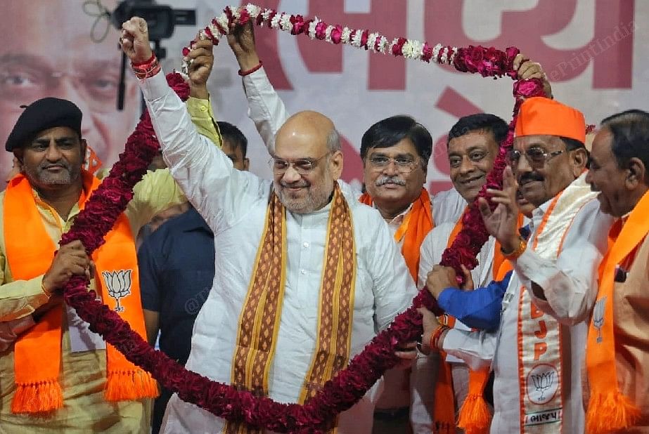 Amit Shah waving at crowd during public meeting | Photo: Praveen Jain | ThePrint
