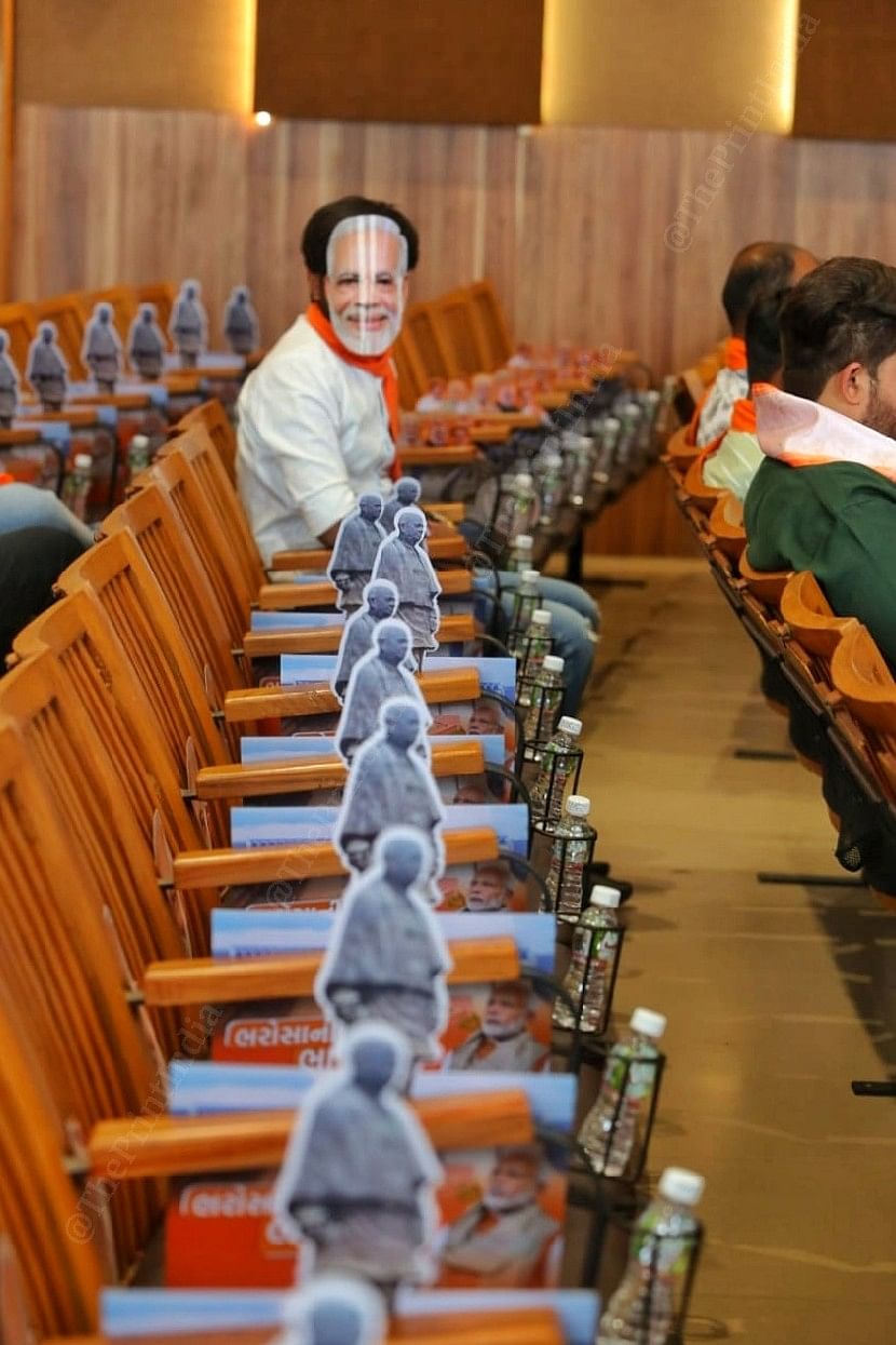 A man wearing a Modi mask at BJP HQ in Ahmedabad | Photo: Praveen Jain | ThePrint