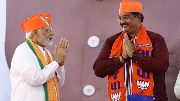 PM Narendra Modi with BJP leader Amit Thaker at a public meeting in October, 2022 | Twitter @AmitThakerBJP