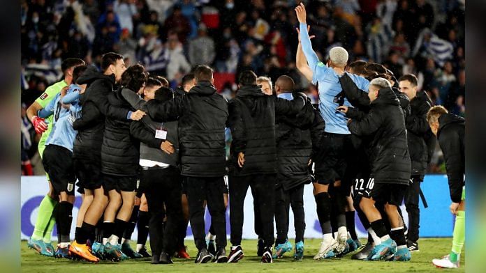 Uruguay players celebrate after qualifying to the World Cup Qatar 2022 Pool | Reuters/Raul Martinez