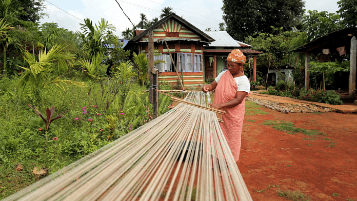 Meghalaya's Eri silk village: A woman weaving threads | Suraj Singh Bisht/ThePrint