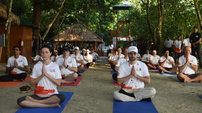 Dignitaries during yoga session Saturday | Twitter @MEAIndia