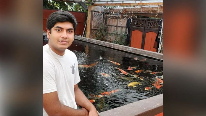 High school student Indeever Madireddy next to his aquarium | Davidson Institute