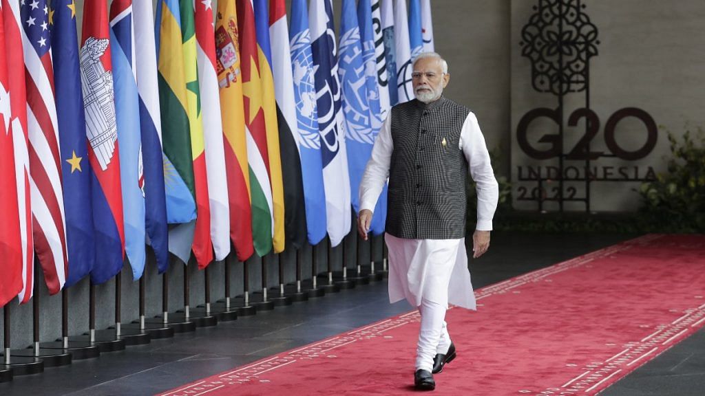 PM Narendra Modi arrives for the G20 Leaders' Summit in Bali, Indonesia, on 15 November 2022 | MAST IRHAM/Pool via Reuters