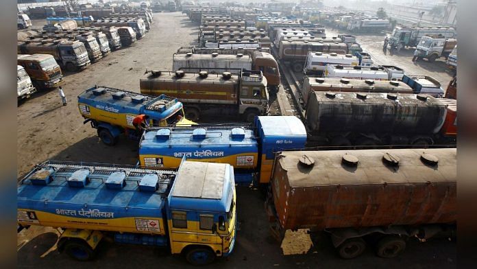 Oil tankers are seen parked at a yard outside a fuel depot on the outskirts of Kolkata | Reuters/Rupak De Chowdhuri