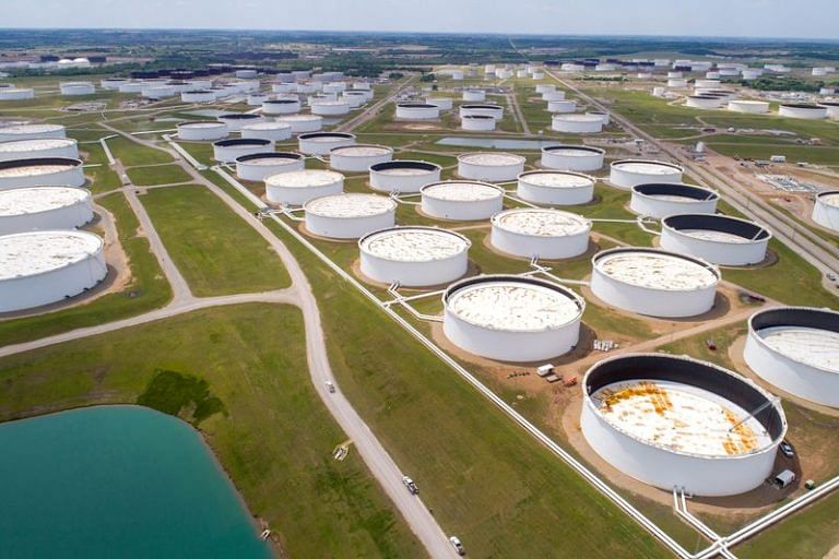 Oil prices rise as weaker dollar offsets China COVID-19 concerns