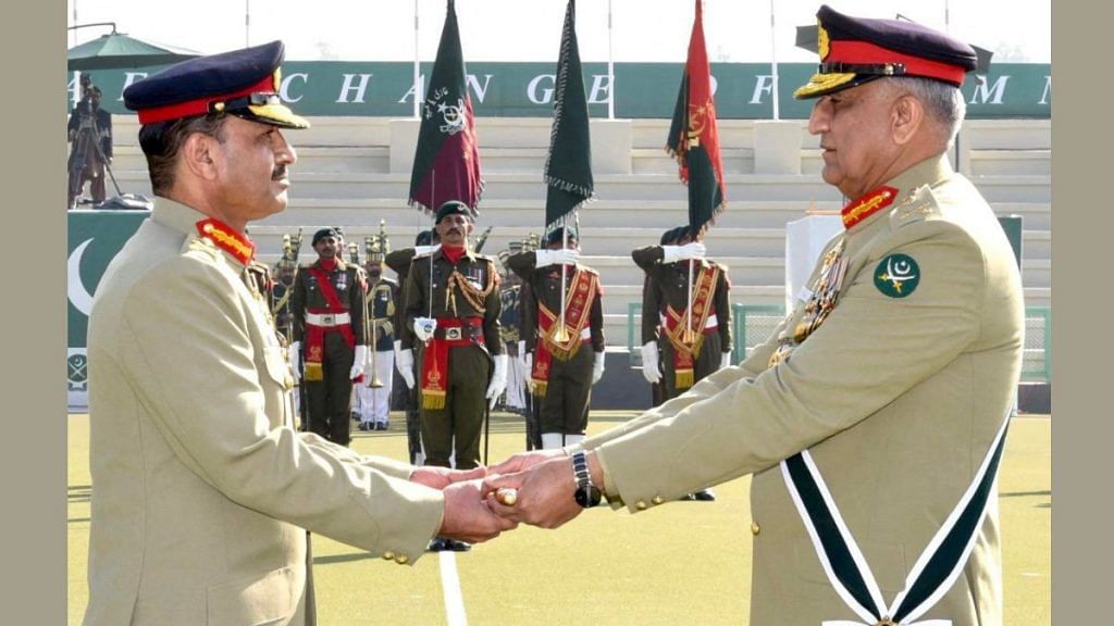 Outgoing Chief of Army Staff General Qamar Javed Bajwa hands over the baton of command over to the newly appointed Army Chief General Asim Munir (L), during a ceremony at the army headquarters in Rawalpindi, Pakistan, on 29 November 2022 | ISPR/handout via Reuters