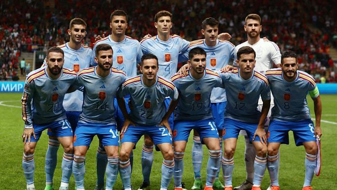 Spain players pose for a team group photo before a match against Portugal on 27 September 2022 | Reuters