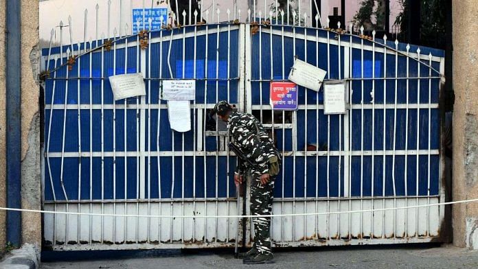 A security person stands guard at Tihar jail | Credit: ANI Photo