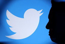 File photo of Elon Musk and Twitter logo seen through magnifier | Reuters/ /Dado Ruvic/Illustration