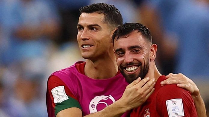 Portugal's Cristiano Ronaldo and Bruno Fernandes celebrate after the match at Lusail Stadium, Lusail, Qatar on 28 November, 2022 | Reuters